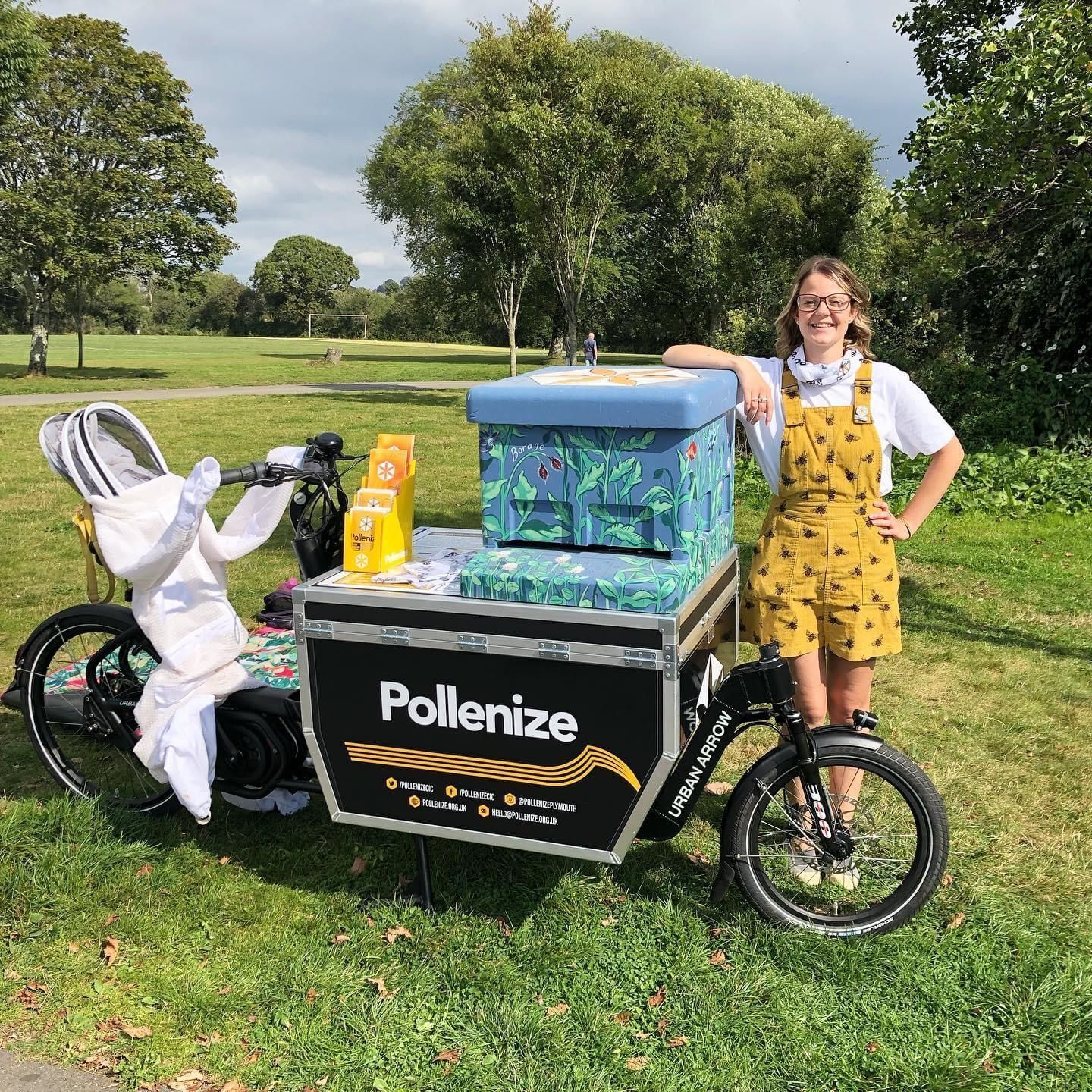Brittany Clarke Marketing and Communications Assistant at Pollenize with their E cargo bike and decorated beehive in Central park Credit University of Plymouth